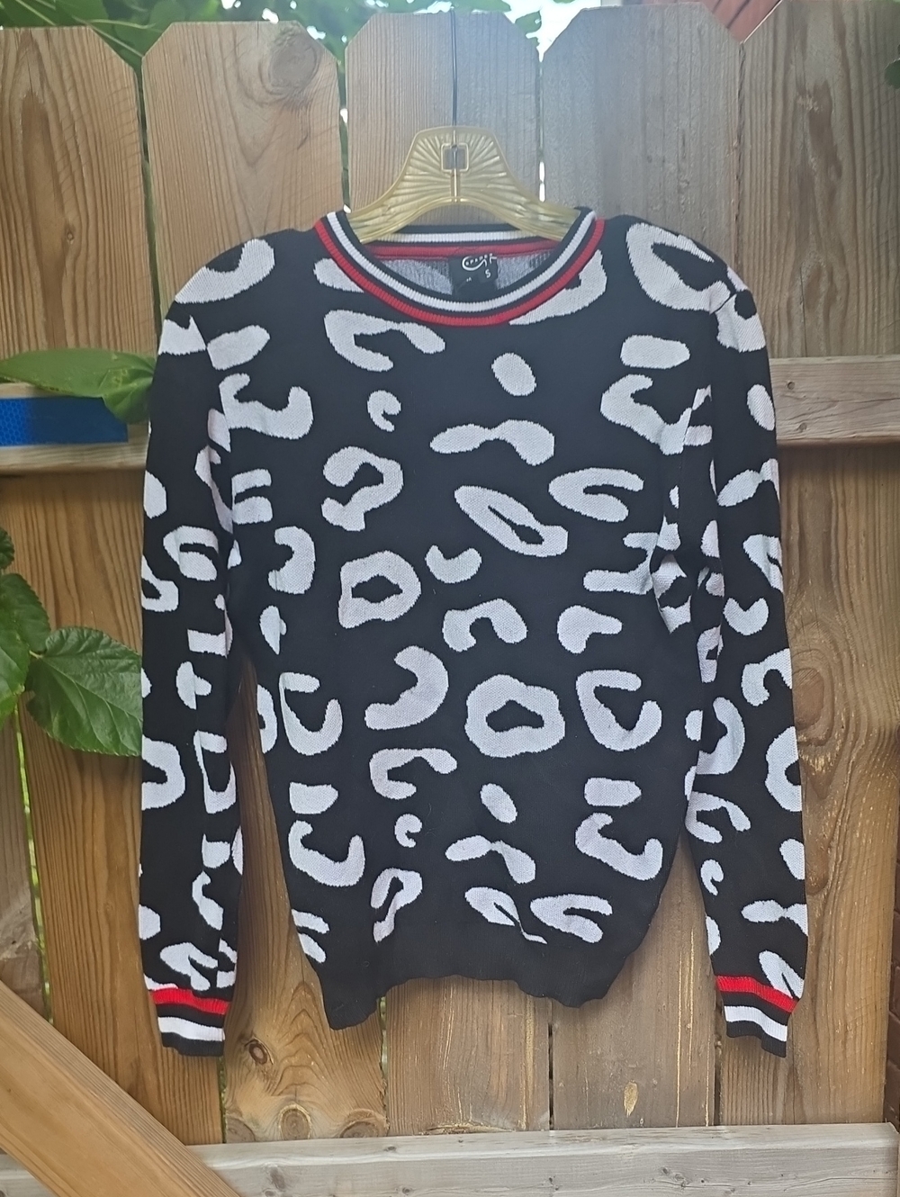 Black & White Leopard Print Crewneck Sweater with Red Trim